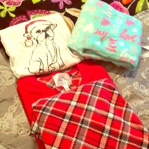 Two sets of women’s warm pajamas. Fleece pants